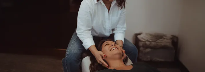 Chiropractor Lincoln NE Sierra Marquez-Mazour Neck Pain Sierra Marquez-Mazour adjusting a patients neck