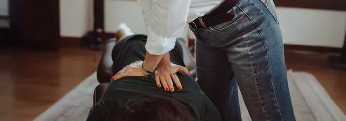 Chiropractor Lincoln NE Sierra Marquez-Mazour Upper Extremity Sierra Marquez-Mazour adjusting upper extremitys of a patient